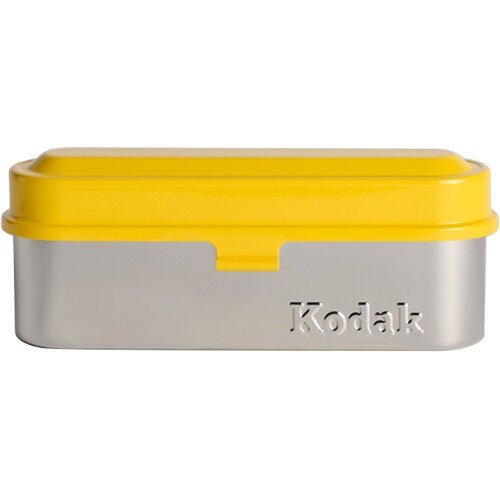 Kodak 135mm steel film case, yellow and silver.