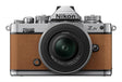 Nikon Z fc mirrorless camera in amber brown with 16-50mm lens