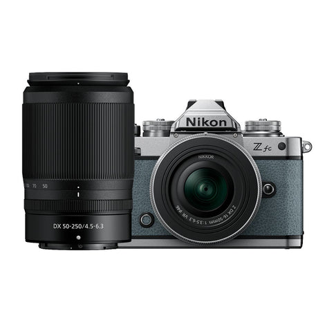 Nikon Z fc Chalk Blue mirrorless camera with two Nikkor Z zoom lenses