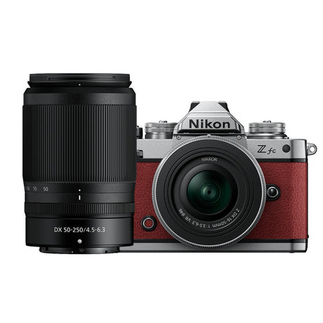 Nikon Z fc Crimson Red mirrorless camera with two Nikkor Z zoom lenses