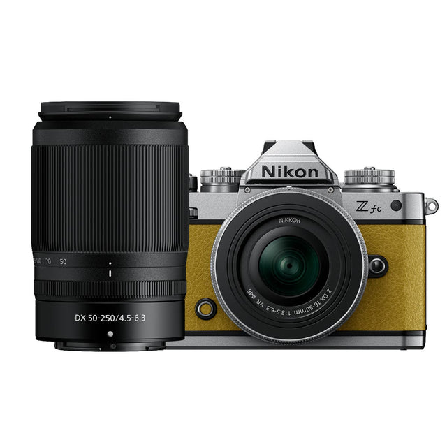 Nikon Z fc Mustard Yellow mirrorless camera with two Nikkor Z zoom lenses