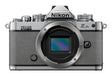 Nikon Z fc mirrorless camera in natural grey with two zoom lenses