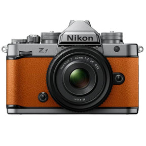 Nikon Zf full frame mirrorless camera in sunset orange with Nikkor Z 40mm f/2 SE lens