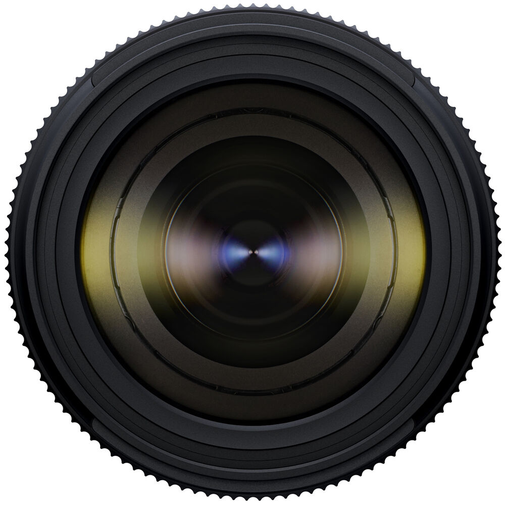 Black Tamron 25-200mm lens standing upright, front three-quarter view, on a white background
